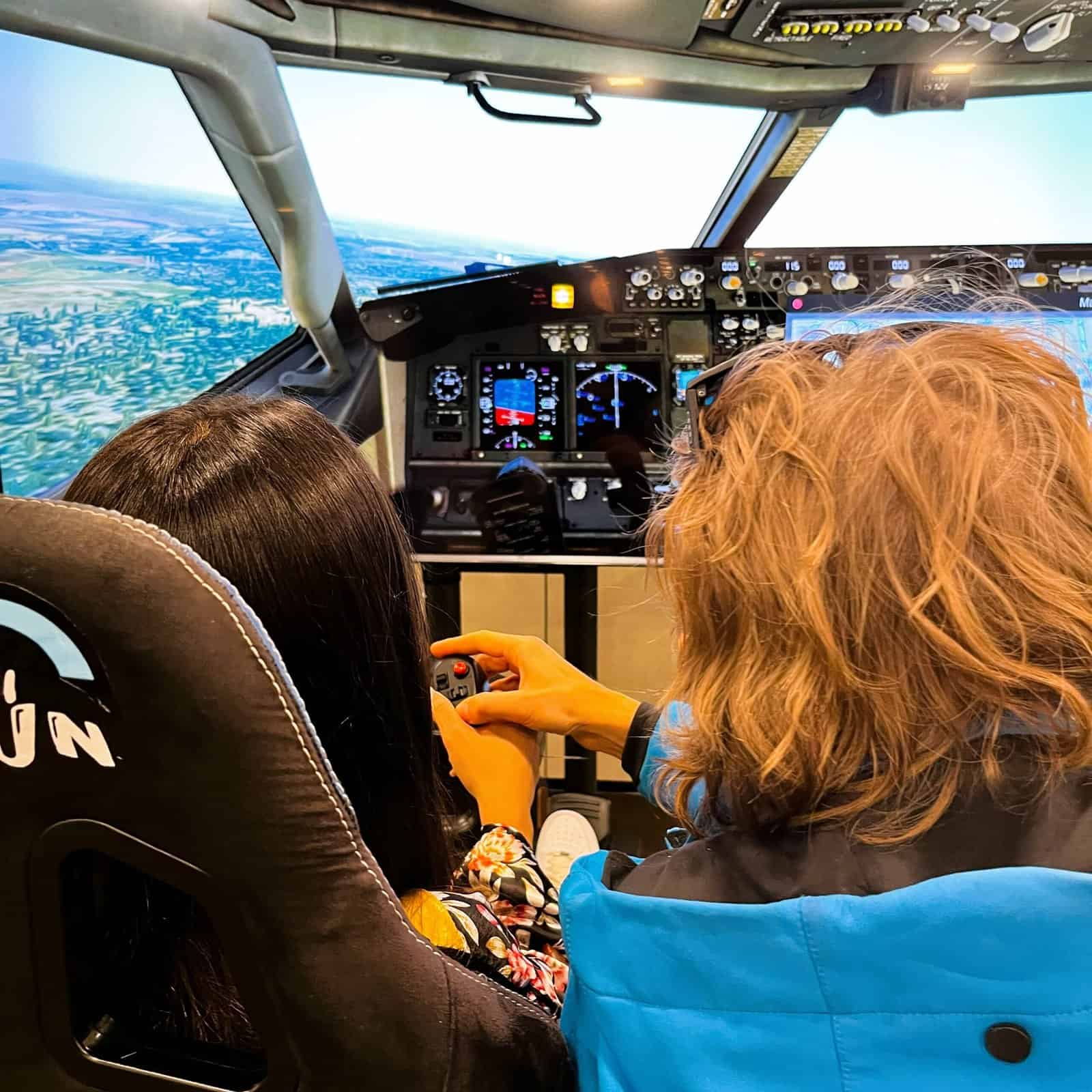 Rental Flight Simulator in Vienna with company and partners logo. Rental airplane simulators turnkey for company event in European Union