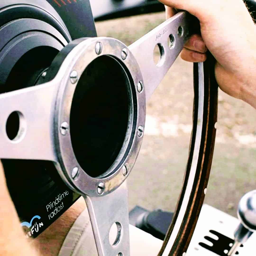 RoarFun Clients Eliska Junkova heritage old british steering wheel on simulator Targa Florio Bugatti immersive experience with motion and virtual reality