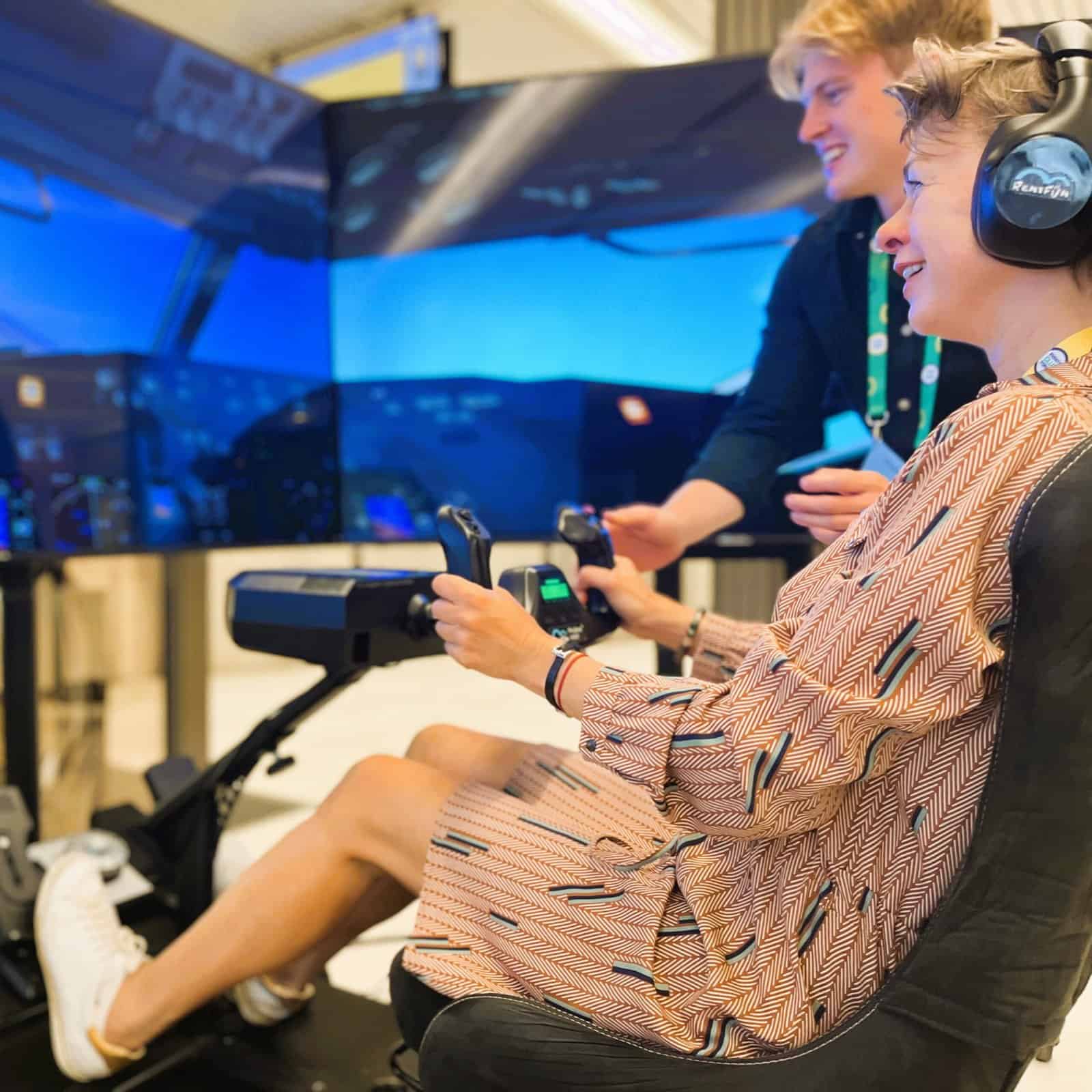 Happy lady with RoarFun flight simulator.
